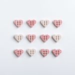 Récréatys Sachet boutons fantaisie 12 cœurs layette roses